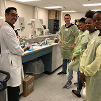 Students and an instuctor prepare to begin a skills lab at the MUSC College of Dental Medicine during the Summer Careers Academy