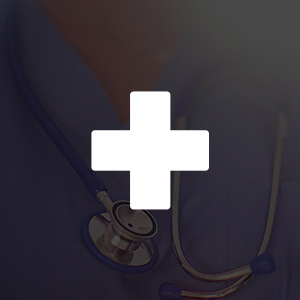 Professional in scrubs with stethoscope